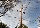 photo Electric pole cheat for porch downed power line on 10th.jpg
